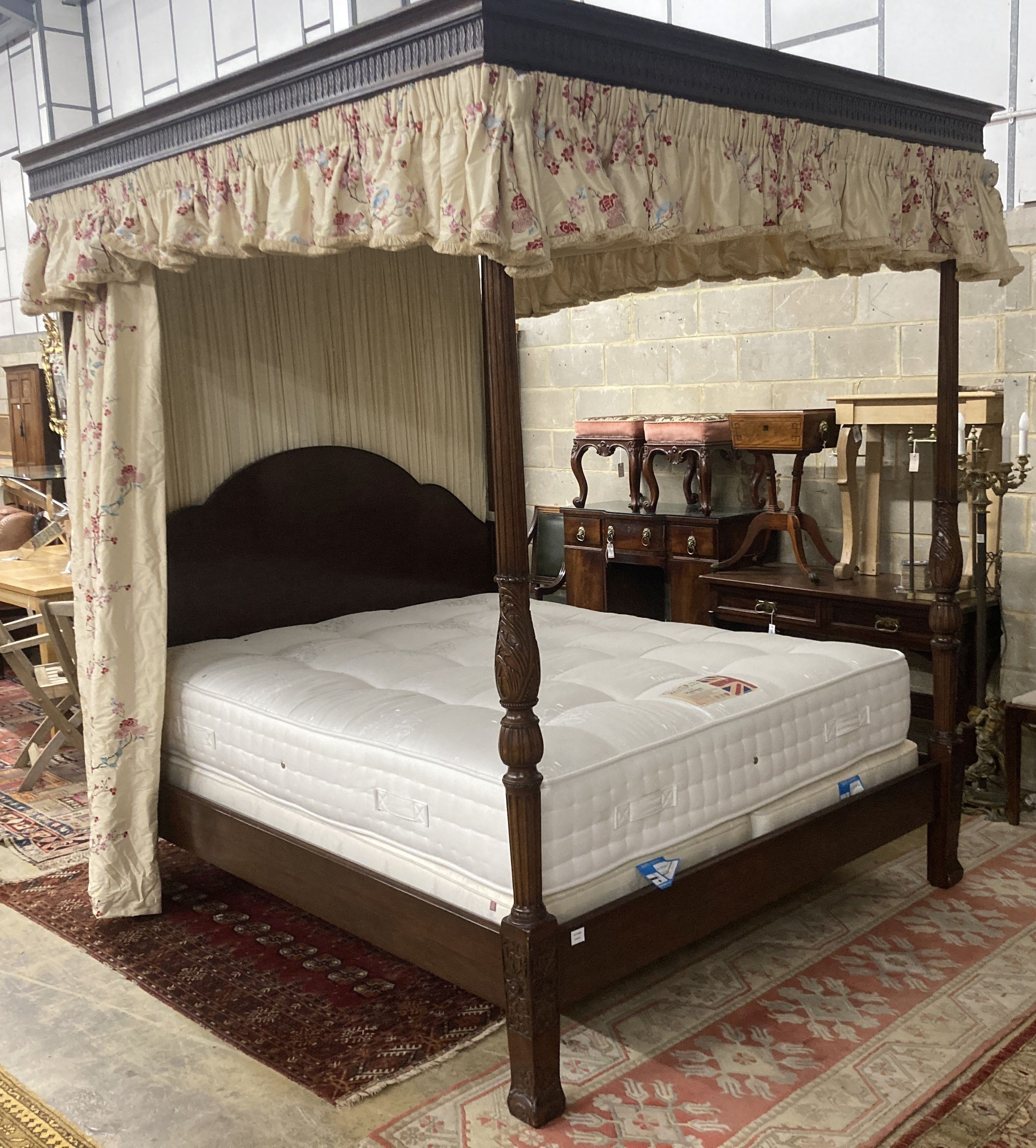 And So To Bed. A George III style mahogany four poster 5ft bedstead, together with drapes, divan and mattress, L.215cm